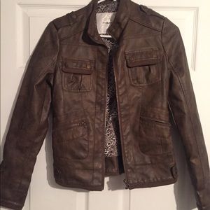Maurice’s brown leather jacket